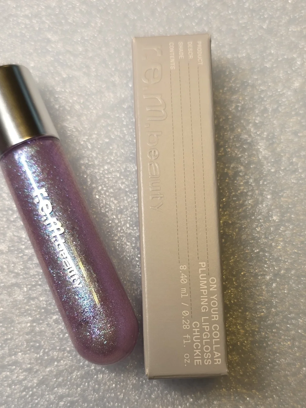 Rem.beauty On Your Collar Plumping Lip Gloss — Iridescent Purple Shine